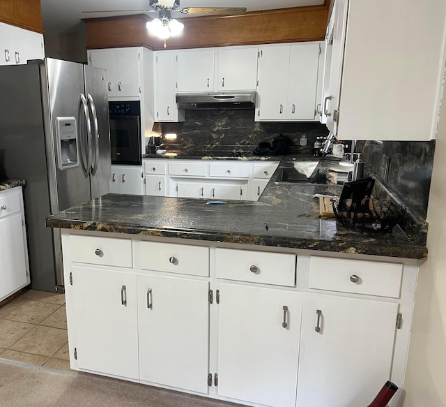 kitchen with black appliances, white cabinets, ceiling fan, tasteful backsplash, and light tile patterned flooring