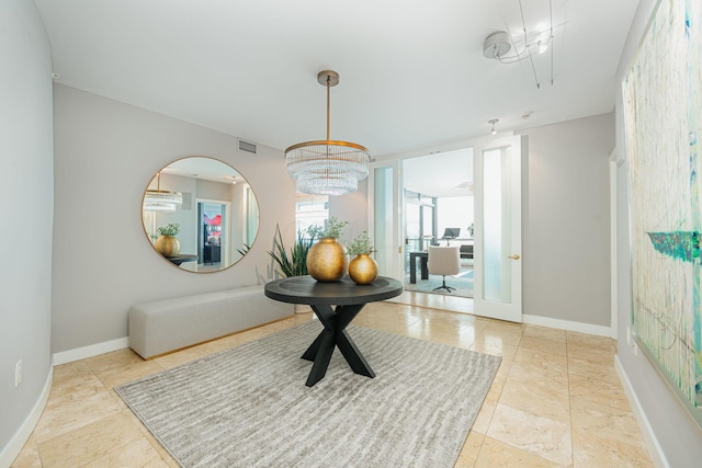 interior space with an inviting chandelier