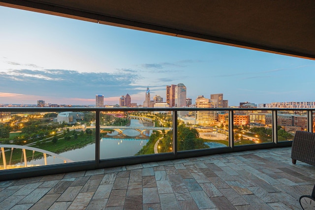 balcony at dusk with a water view