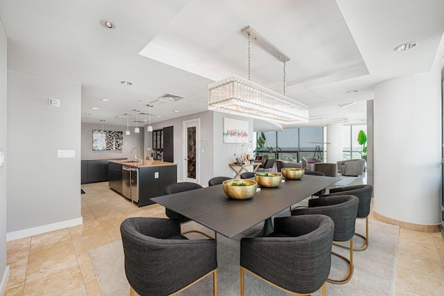 dining space featuring sink