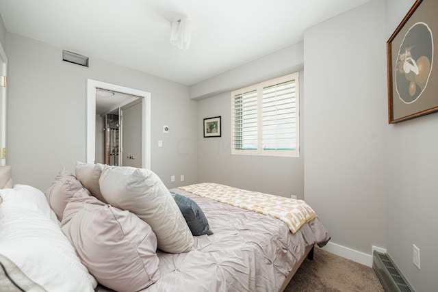 bedroom featuring carpet