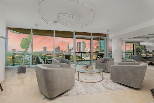 tiled living room with a wall of windows