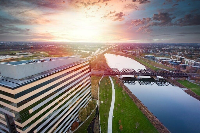 aerial view at dusk with a water view