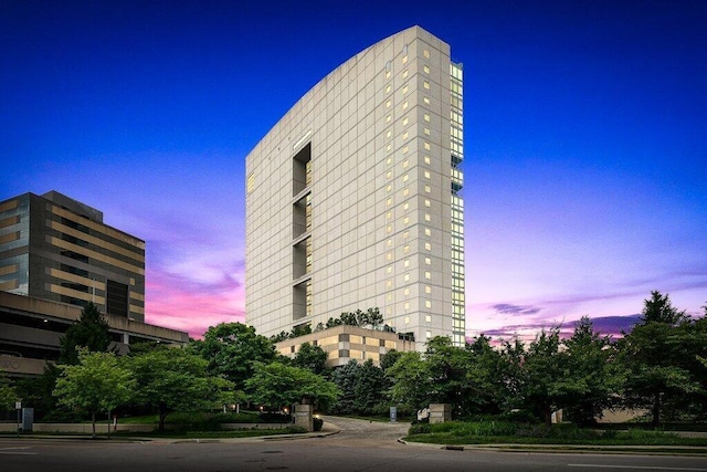 view of outdoor building at dusk