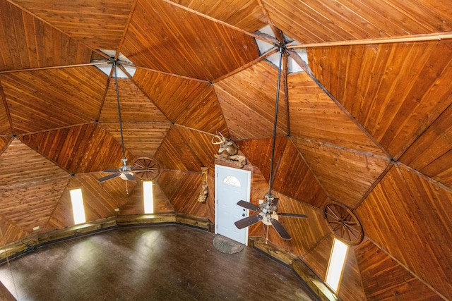 interior details featuring ceiling fan and wood ceiling