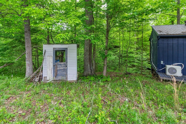 view of outdoor structure with ac unit