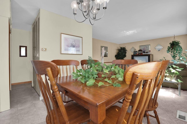 dining room featuring an inviting chandelier