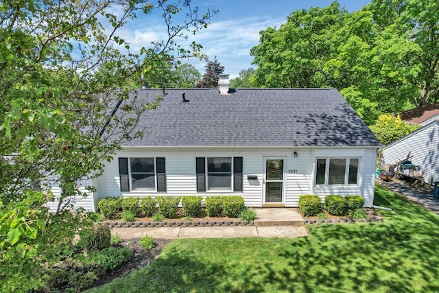 view of front of home with a front yard