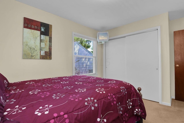 carpeted bedroom featuring a closet