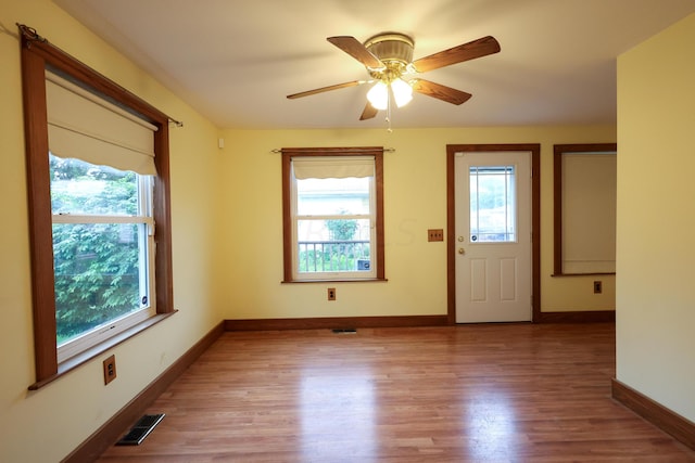 entrance foyer featuring ceiling fan and light hardwood / wood-style floors