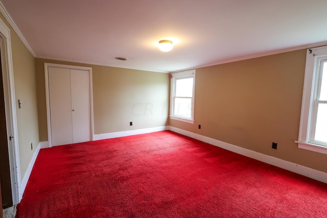 unfurnished bedroom with carpet flooring and ornamental molding