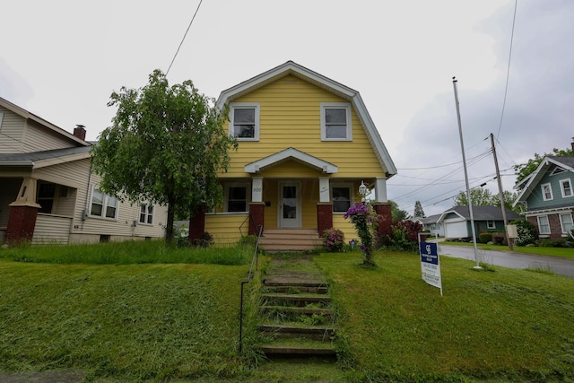 view of front of property featuring a front lawn