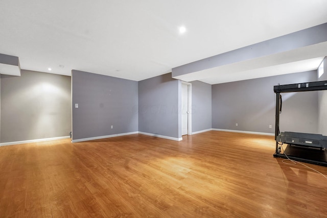 basement featuring light hardwood / wood-style floors