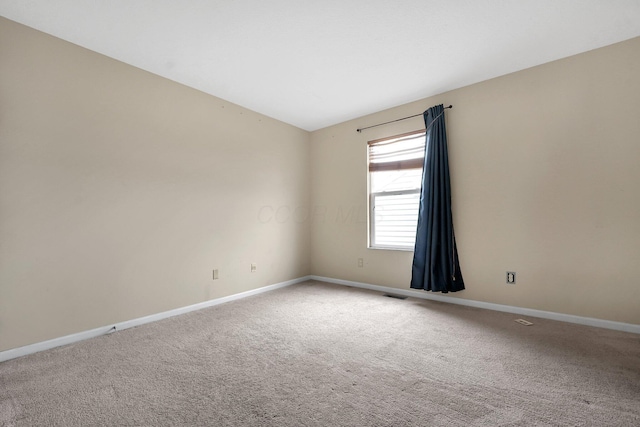 view of carpeted spare room