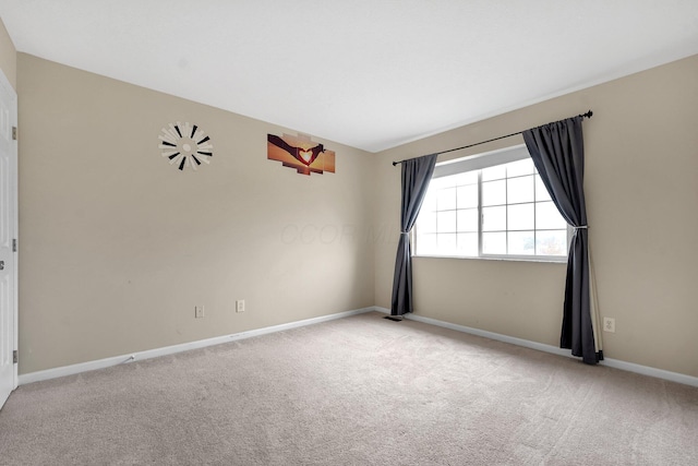 view of carpeted spare room