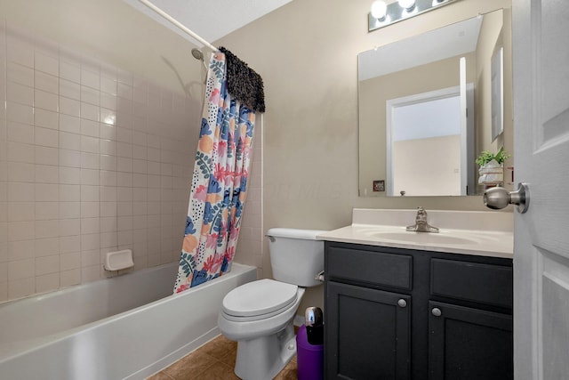 full bathroom with tile patterned flooring, shower / bath combination with curtain, vanity, and toilet