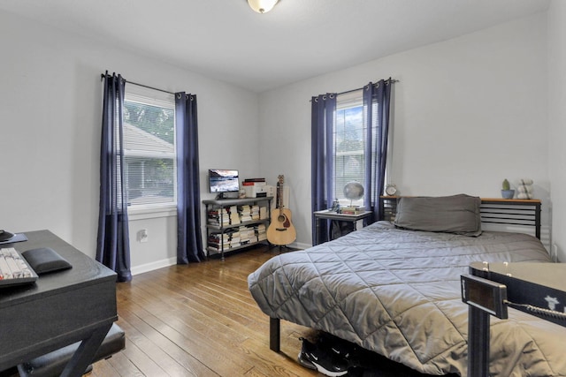 bedroom featuring hardwood / wood-style flooring