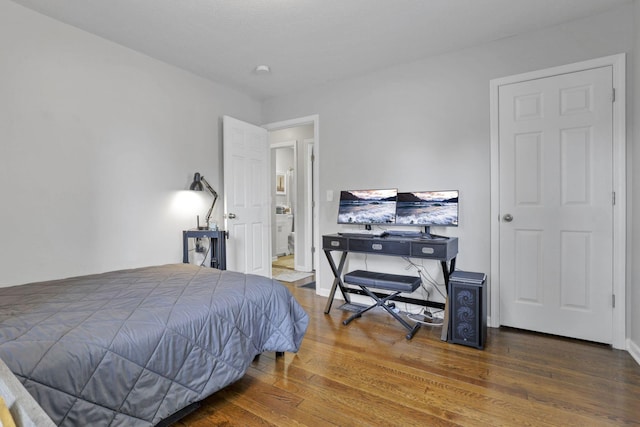 bedroom featuring dark hardwood / wood-style floors