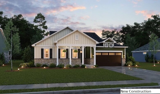 craftsman inspired home with covered porch and a yard