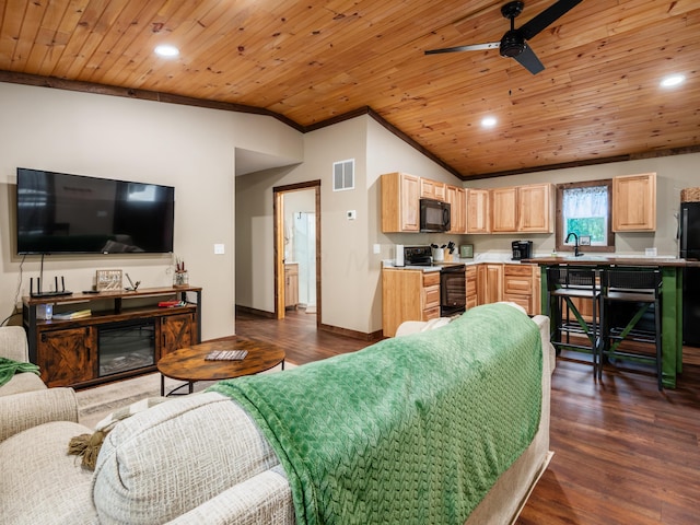 living room featuring dark hardwood / wood-style flooring, vaulted ceiling, and wooden ceiling