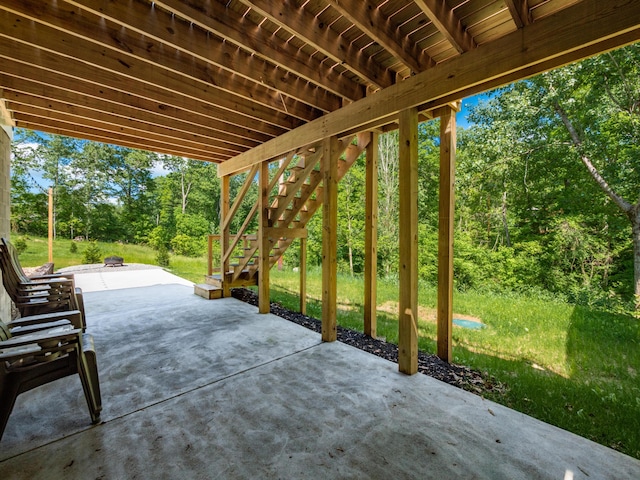 view of patio / terrace featuring a fire pit