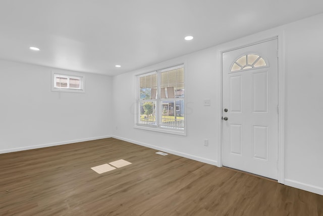 entrance foyer with dark hardwood / wood-style flooring