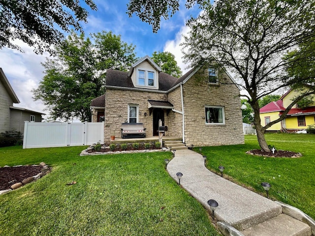 view of front of home with a front yard