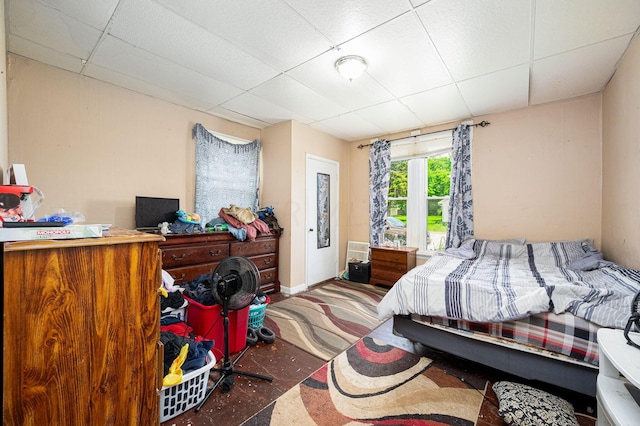 bedroom featuring a drop ceiling