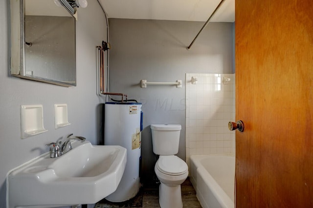 full bathroom with bathtub / shower combination, sink, water heater, wood-type flooring, and toilet