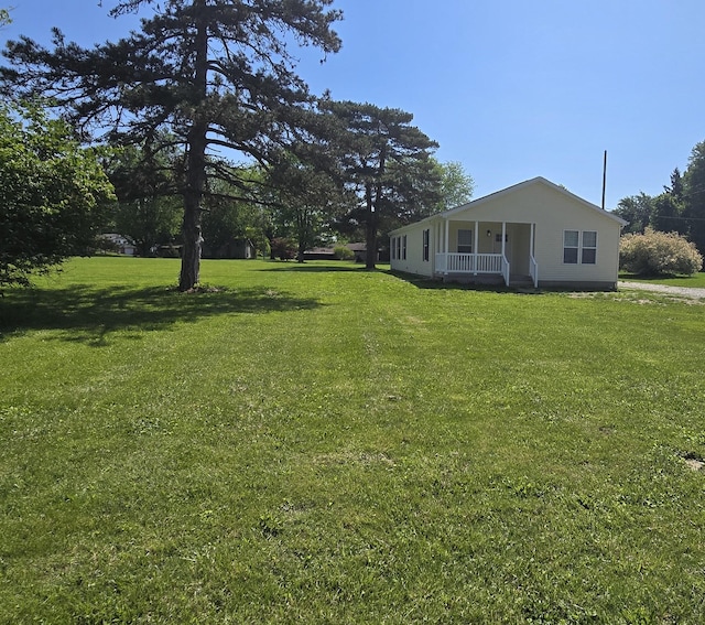 view of yard featuring a porch