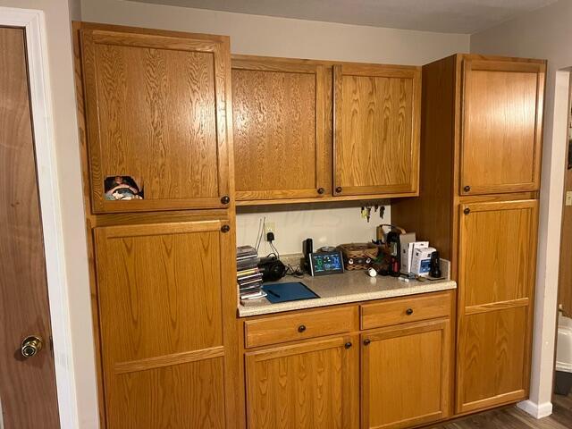 kitchen featuring dark hardwood / wood-style flooring