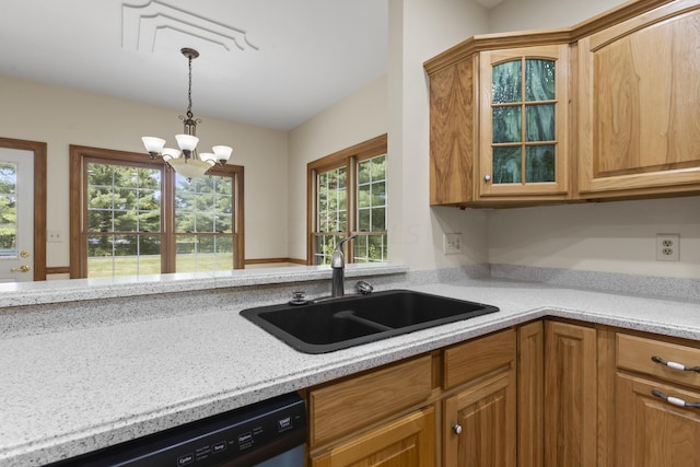 kitchen with a chandelier, stainless steel dishwasher, plenty of natural light, and sink