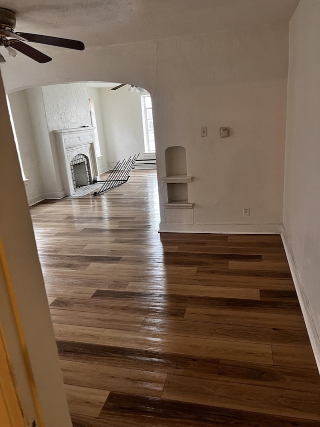 1001 Lilley Ave, Columbus, OH 43206 - unfurnished living room featuring hardwood / wood-style floors, a textured ceiling, and ceiling fan
