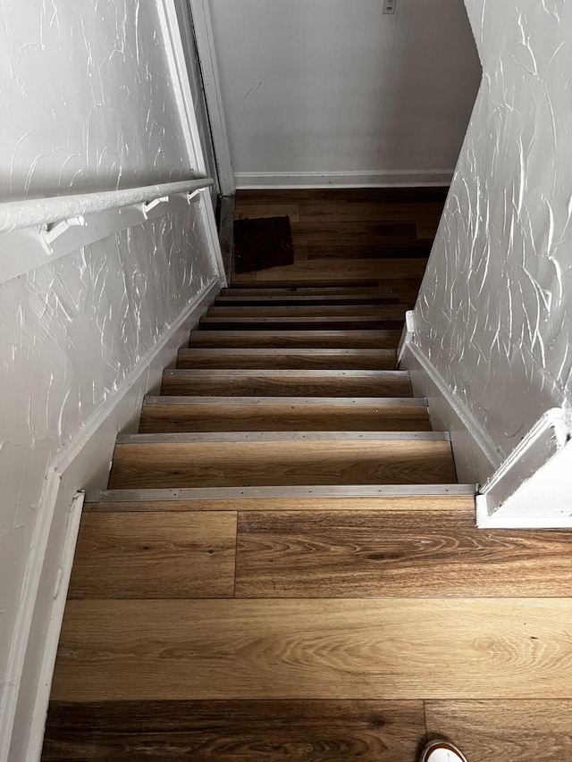 1001 Lilley Ave, Columbus, OH 43206 - staircase featuring hardwood / wood-style flooring