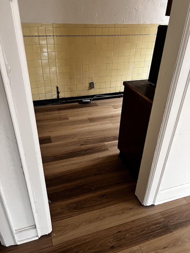1001 Lilley Ave, Columbus, OH 43206 - bathroom with hardwood / wood-style floors and tile walls