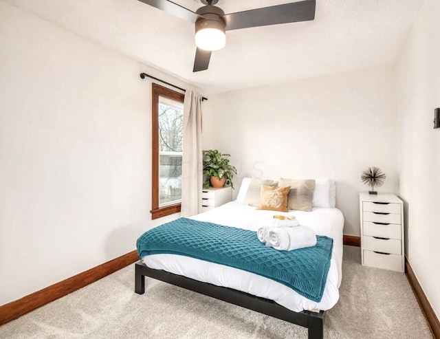 bedroom with carpet flooring and ceiling fan