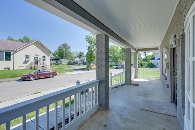 view of patio featuring a porch