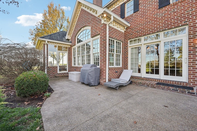 view of patio with a grill