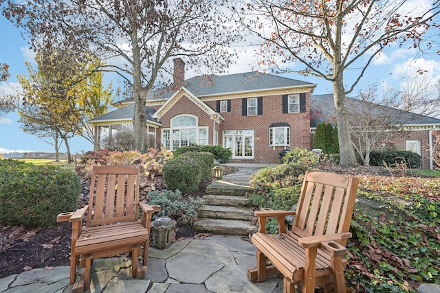 rear view of house with a patio