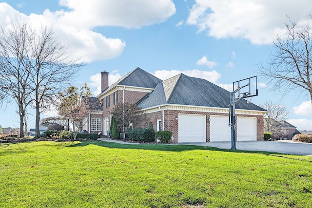 view of front of house featuring a garage and a front lawn