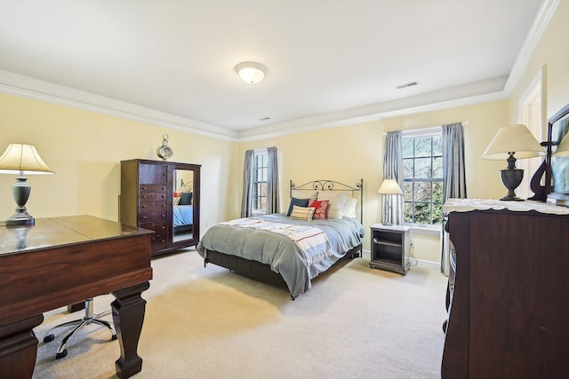 carpeted bedroom featuring ornamental molding