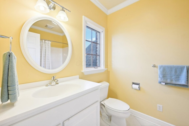 bathroom featuring tile patterned flooring, vanity, toilet, and crown molding