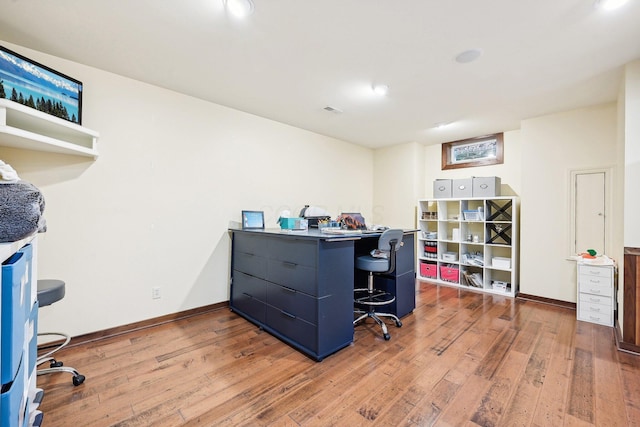 office area with wood-type flooring