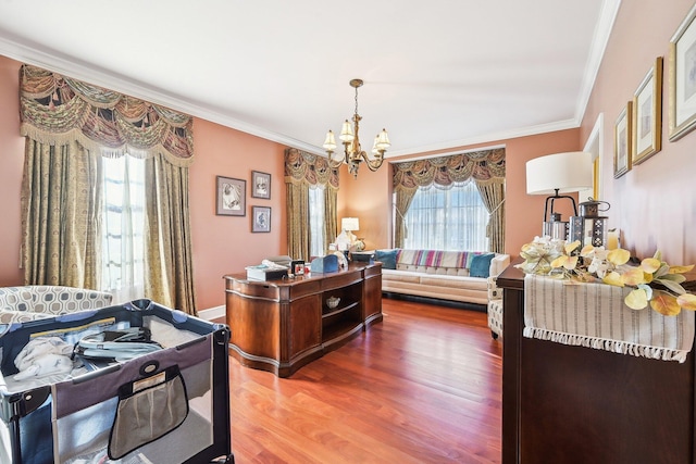 office with a chandelier, ornamental molding, and hardwood / wood-style flooring