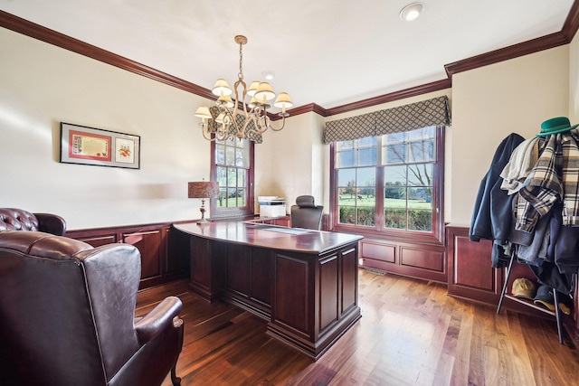 office space featuring a notable chandelier, dark hardwood / wood-style floors, and crown molding