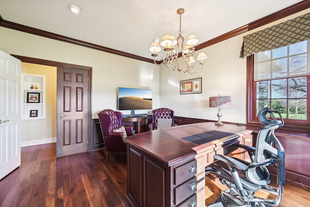 office area with dark hardwood / wood-style floors, an inviting chandelier, and ornamental molding