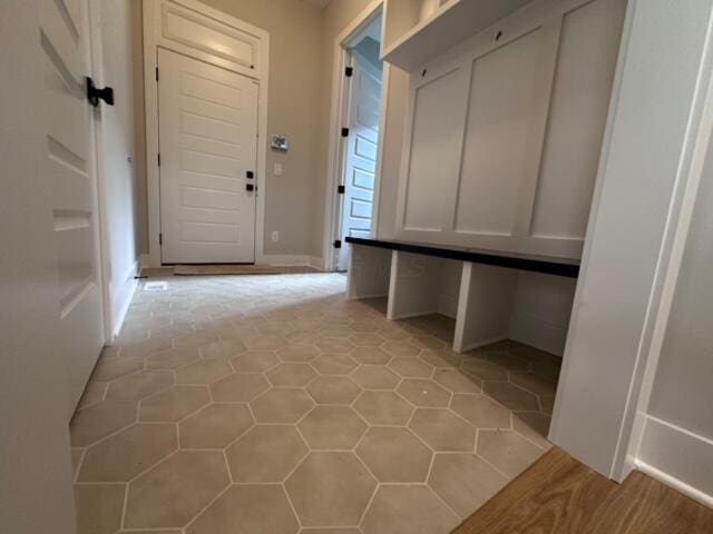 mudroom featuring light tile patterned floors