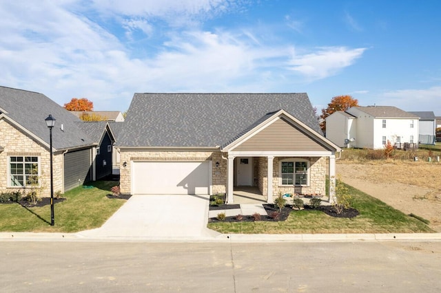 view of front of property featuring a porch and a garage