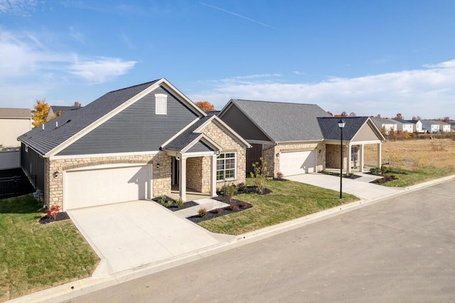 view of front of home with a garage and a front yard