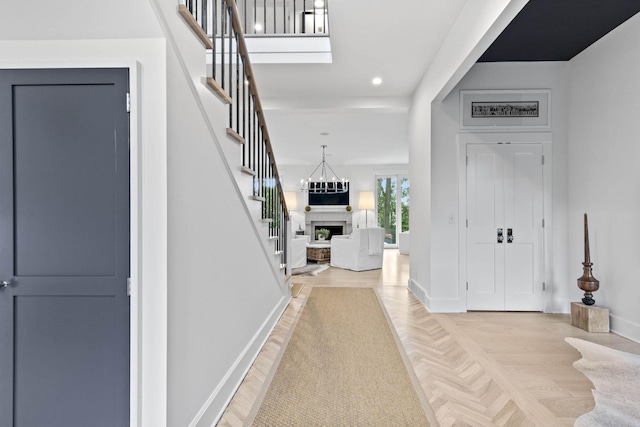 foyer with light parquet floors